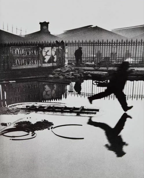 Henri-Cartier-Bresson-Behind-the-Gare-Saint-Lazare-Paris-1932-1